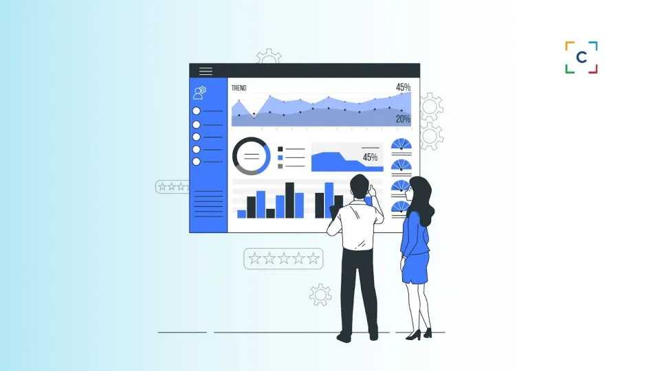 Two professionals analyze data on a large dashboard in a modern office setting